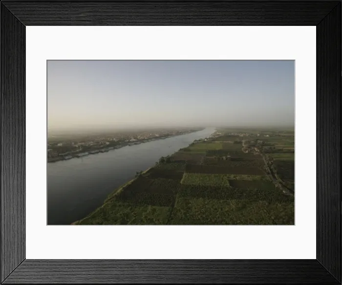 Framed Print : A view of the River Nile at sunrise, near Luxor, Egypt, North Africa, Africa Framed Print : A view of the River Nile at sunrise, near Luxor, Egypt, North Africa, Africa