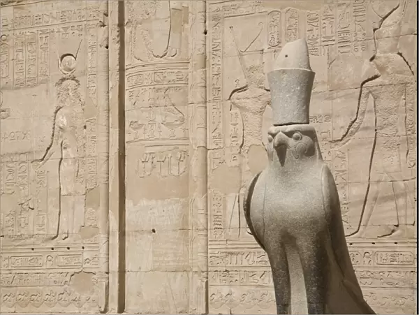 Statue of the falcon, sacred bird of Horus, at the entrance of the Temple of Edfu