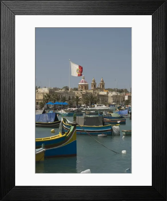 Framed Print : Brightly coloured fishing boats called Luzzus at the fishing village of Marsaxlokk Framed Print : Brightly coloured fishing boats called Luzzus at the fishing village of Marsaxlokk