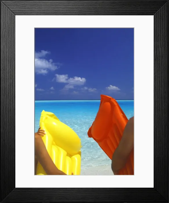 Framed Print : A couple with air matress, Maldives, Indian Ocean, Asia