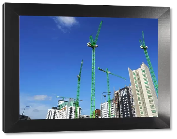 Cranes on an apartment building site, Manchester, England, United Kingdom, Europe