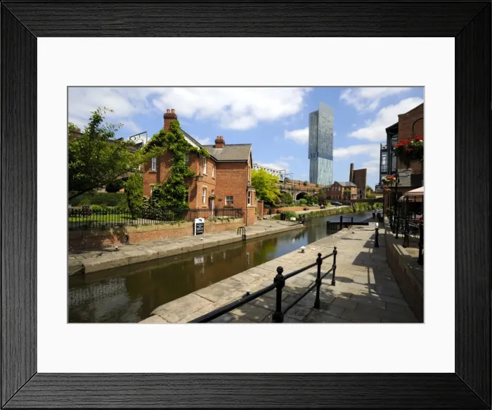 Framed Print : Canal and lock keepers cottage at Castlefield with the Beetham Tower in the background Framed Print : Canal and lock keepers cottage at Castlefield with the Beetham Tower in the background