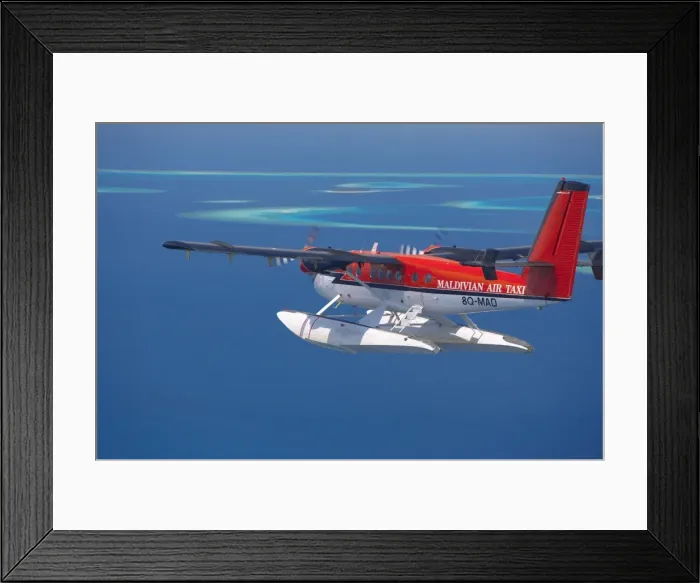 Framed Print : Aerial view of Maldivian air taxi flying in the Maldives archipelago, Indian Ocean, Asia Framed Print : Aerial view of Maldivian air taxi flying in the Maldives archipelago, Indian Ocean, Asia