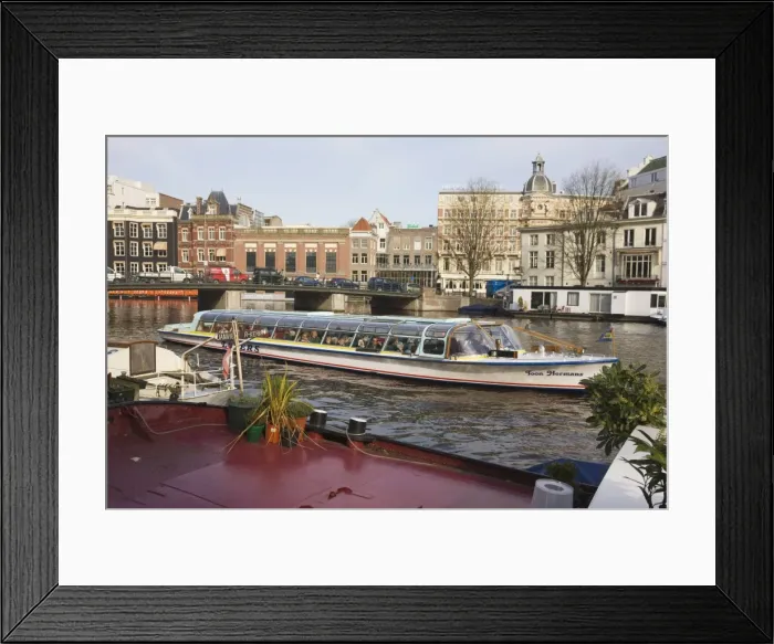 Framed Print : Tourist boat on the Amstel River, Amsterdam, Netherlands, Europe Framed Print : Tourist boat on the Amstel River, Amsterdam, Netherlands, Europe