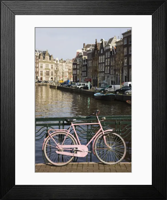 Framed Print : Old pink bicycle by the Herengracht canal, Amsterdam, Netherlands, Europe Framed Print : Old pink bicycle by the Herengracht canal, Amsterdam, Netherlands, Europe