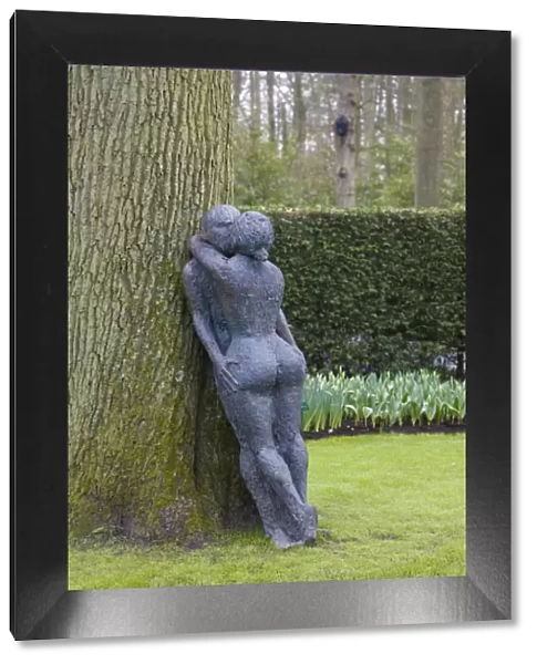 Modern sculpture of nude couple embracing, Keukenhof, park and gardens near Amsterdam