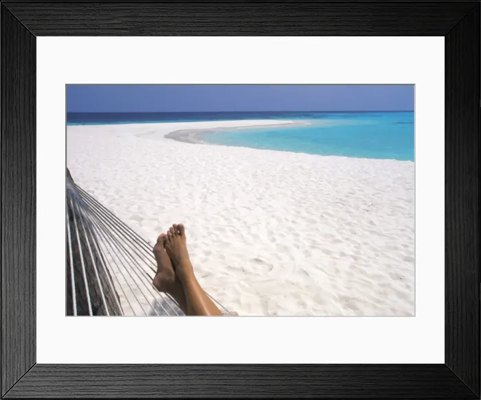 Framed Print : Woman barefoot in hammock, Maldives, Indian Ocean, Asia