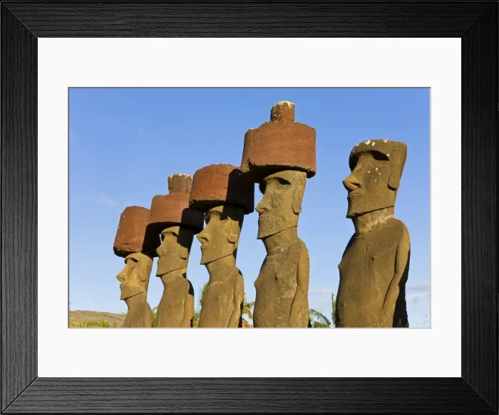 Framed Print : Anakena beach, monolithic giant stone Moai statues of Ahu Nau Nau, four of which have topknots Framed Print : Anakena beach, monolithic giant stone Moai statues of Ahu Nau Nau, four of which have topknots