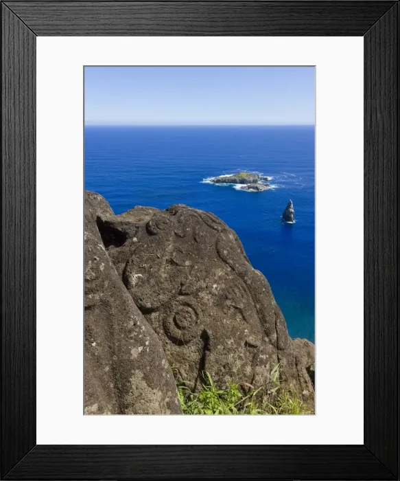 Framed Print : Petroglyphs at the archeological site of Orongo Ceremonial village high on the crater rim of Ranu Kau, Rapa Nui (Easter Island), UNESCO World Heritage Site, Chile Framed Print : Petroglyphs at the archeological site of Orongo Ceremonial village high on the crater rim of Ranu Kau, Rapa Nui (Easter Island), UNESCO World Heritage Site, Chile