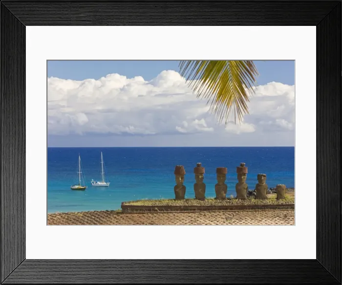 Framed Print : Anakena beach, yachts moored in front of the monolithic giant stone Moai statues of Ahu Nau Nau Framed Print : Anakena beach, yachts moored in front of the monolithic giant stone Moai statues of Ahu Nau Nau