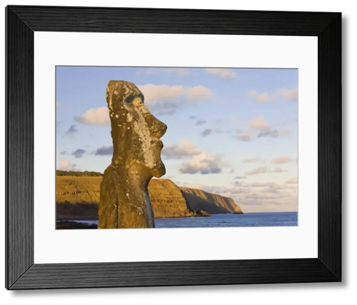 Framed Print : Lone monolithic giant stone Moai statue looking out to sea at Tongariki Framed Print : Lone monolithic giant stone Moai statue looking out to sea at Tongariki