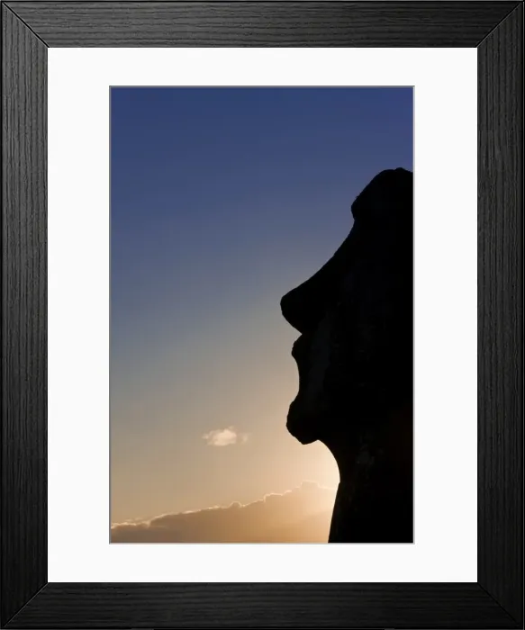 Framed Print : Silhouette of a lone monolithic giant stone Moai statue at Tongariki, Rapa Nui Framed Print : Silhouette of a lone monolithic giant stone Moai statue at Tongariki, Rapa Nui