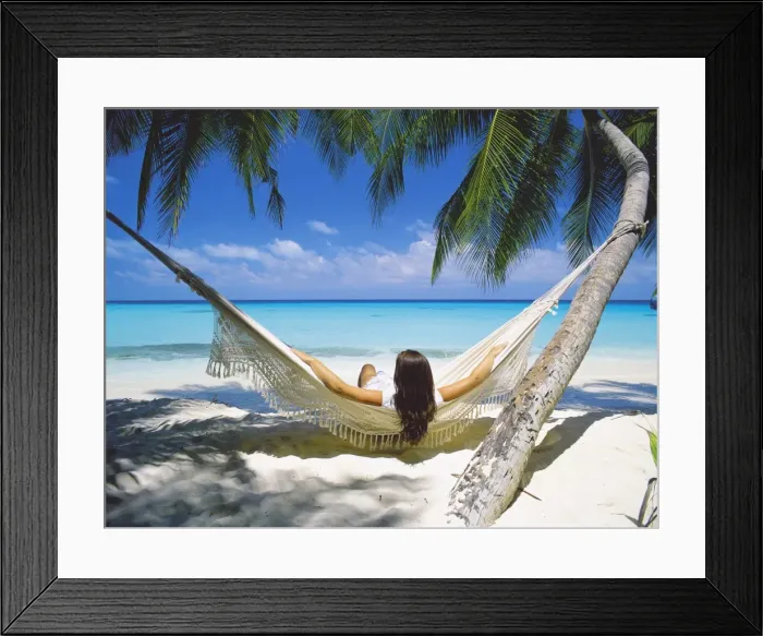 Framed Print : Woman sitting in hammock on beach, Maldives, Indian Ocean, Asia Framed Print : Woman sitting in hammock on beach, Maldives, Indian Ocean, Asia