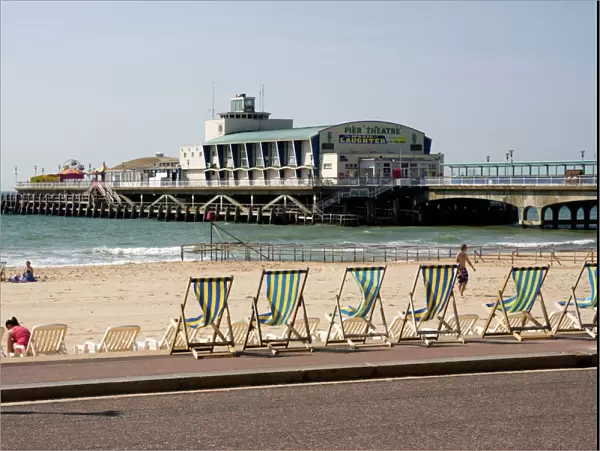 Deckchairs, beach and pier, Bournemouth, Dorset, England, United Kingdom, Europe