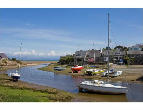 Yachts moored on River Soch estuary waiting for the incoming tide on the Warren