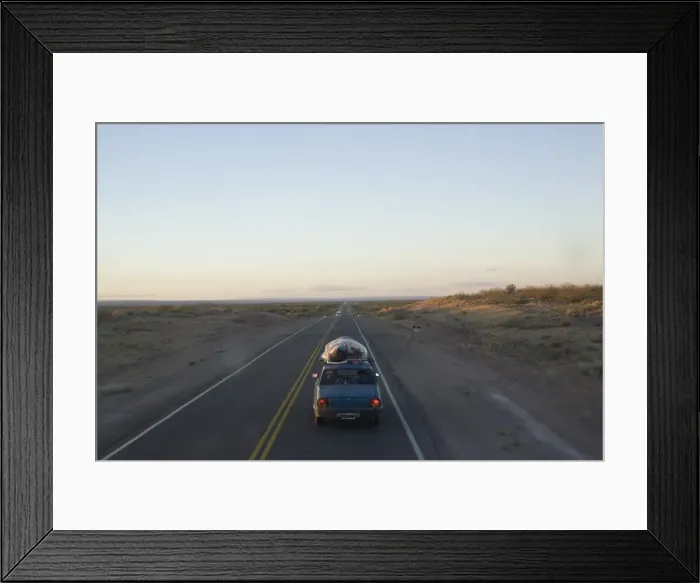 Framed Print : Car driving through the Pampa, Argentina, South America Framed Print : Car driving through the Pampa, Argentina, South America