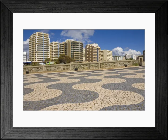 Framed Print : Black and white cobble design on the promenade above Praia da Rocha beach Framed Print : Black and white cobble design on the promenade above Praia da Rocha beach