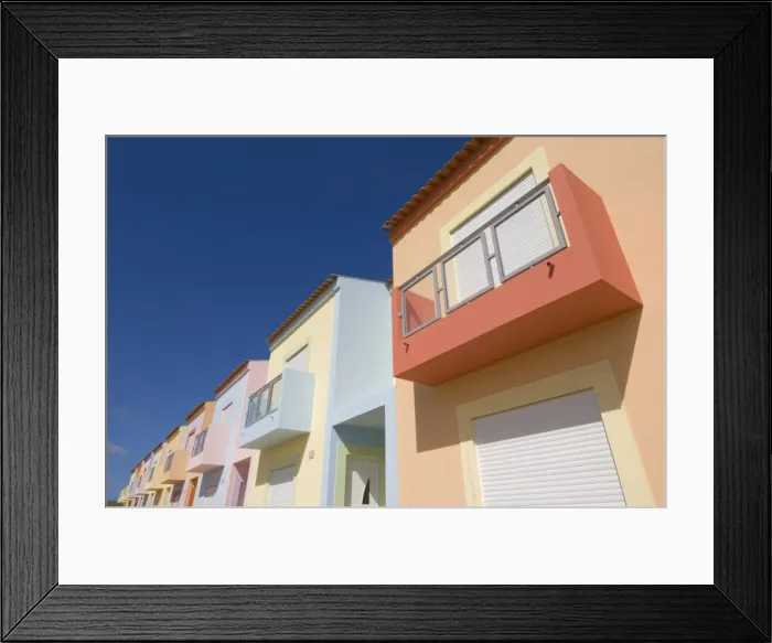 Framed Print : Multi-coloured new terraced houses, Vila da Bispo, near Sagres, Algarve, Portugal, Europe Framed Print : Multi-coloured new terraced houses, Vila da Bispo, near Sagres, Algarve, Portugal, Europe
