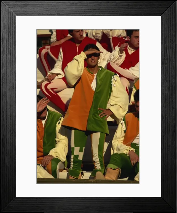 Framed Print : Colourfully dressed contrada member watching the Palio, Siena, Tuscany, Italy, Europe Framed Print : Colourfully dressed contrada member watching the Palio, Siena, Tuscany, Italy, Europe