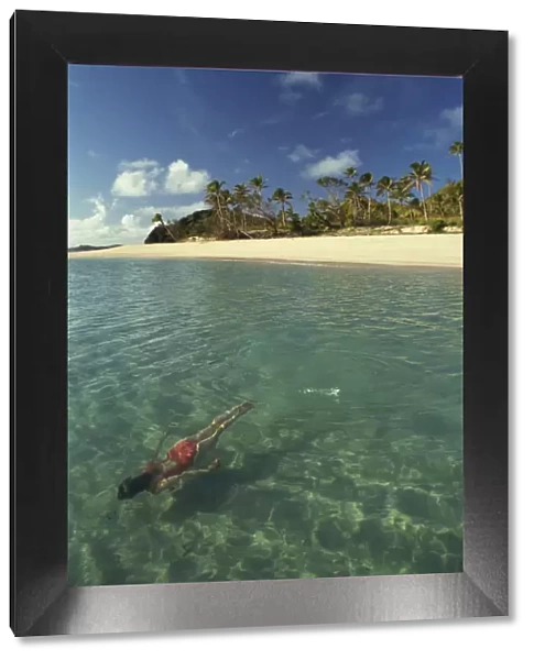 Girl swimming underwater, Yasawa Island, Fiji, Pacific Islands, Pacific