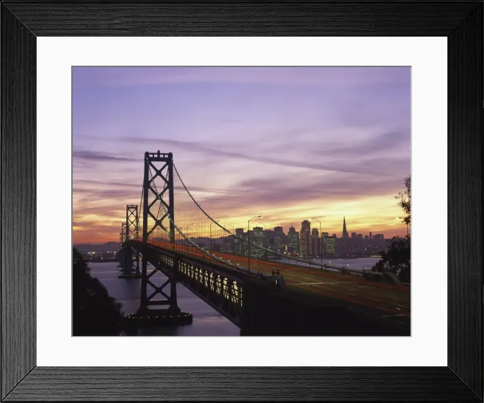 Framed Print : The Bay Bridge, and city skyline in the background, San Francisco, California Framed Print : The Bay Bridge, and city skyline in the background, San Francisco, California