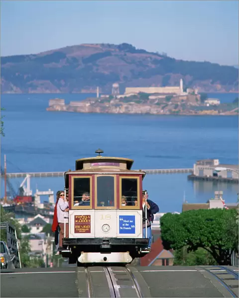 Tram on Russian Hill with view over Alcatraz, San Francisco, California
