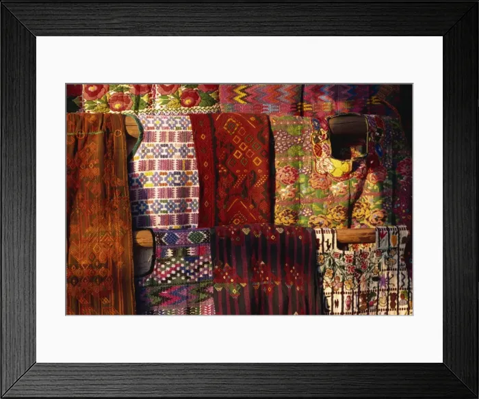 Framed Print : Traditional woven huipiles in the market, Chichicastenango, Quiche Highlands Framed Print : Traditional woven huipiles in the market, Chichicastenango, Quiche Highlands
