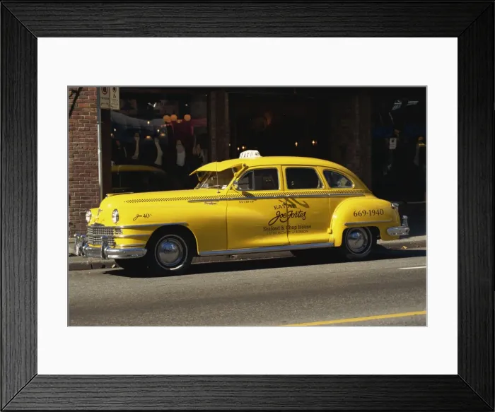 Framed Print : Yellow cab on a street in Vancouver, British Columbia, Canada, North America Framed Print : Yellow cab on a street in Vancouver, British Columbia, Canada, North America