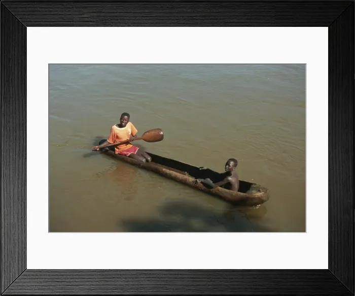Framed Print : Dugout canoe used as ferry, Bonga River, Ethiopia, Africa Framed Print : Dugout canoe used as ferry, Bonga River, Ethiopia, Africa