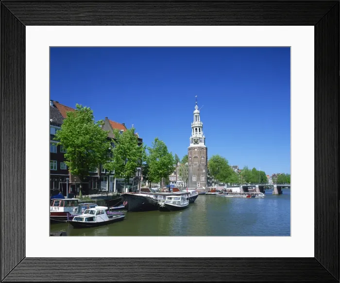 Framed Print : Boats on the Ovde Schans Canal with the Montelbaanstoren tower behind, in Amsterdam Framed Print : Boats on the Ovde Schans Canal with the Montelbaanstoren tower behind, in Amsterdam
