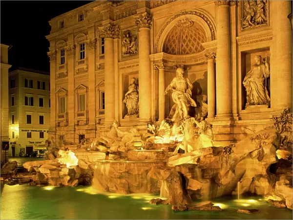 The Trevi Fountain illuminated at night in Rome, Lazio, Italy, Europe