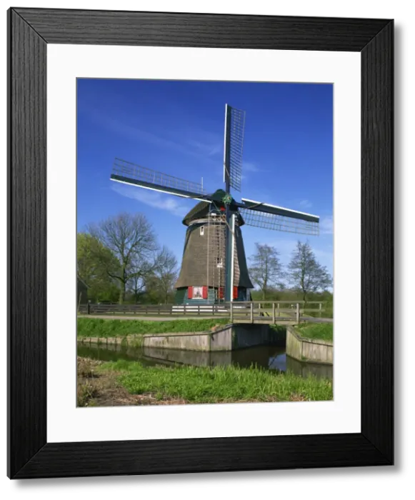 Framed Print : Canal and thatched windmill at Edam, Holland, Europe Framed Print : Canal and thatched windmill at Edam, Holland, Europe