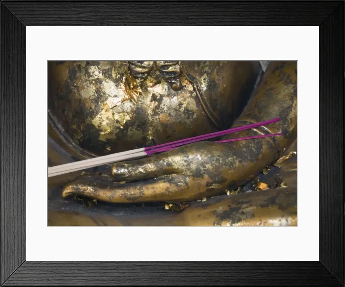 Framed Print : Buddha covered with gold leaf offerings and joss sticks, Bangkok, Thailand Framed Print : Buddha covered with gold leaf offerings and joss sticks, Bangkok, Thailand