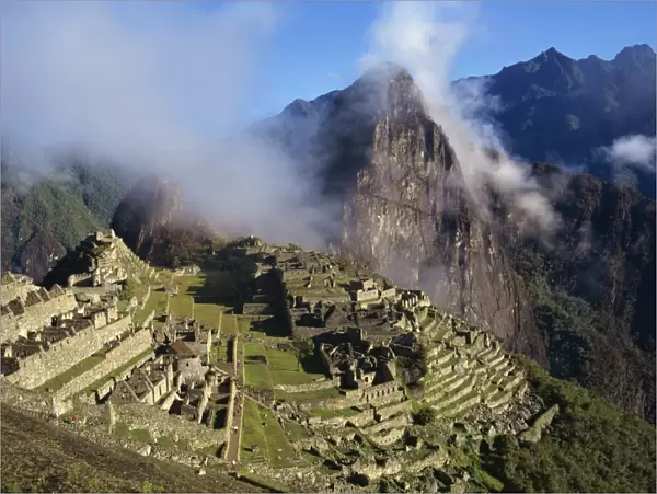 Clouds over the mountains behind the site of Machu Picchu, UNESCO World Heritage Site