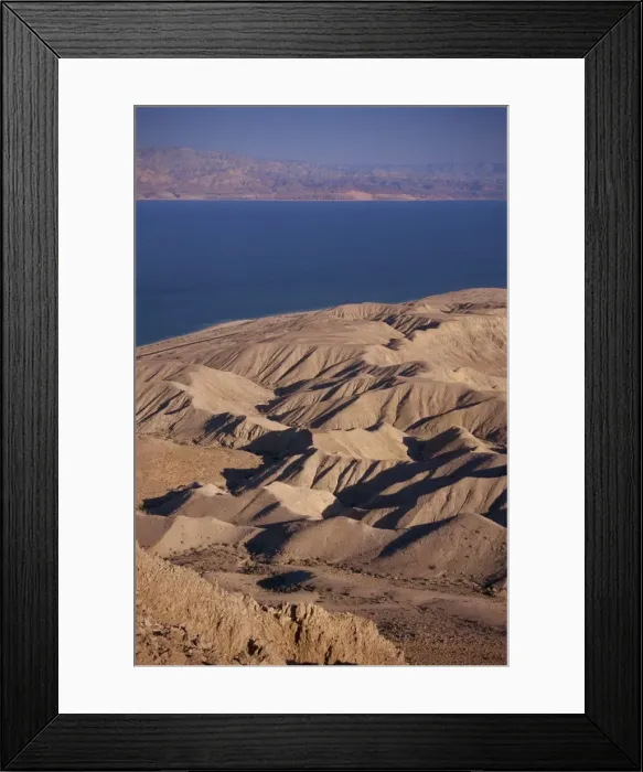 Framed Print : Arid hills on shore of Dead Sea, with Jordanian Mountains in the background Framed Print : Arid hills on shore of Dead Sea, with Jordanian Mountains in the background