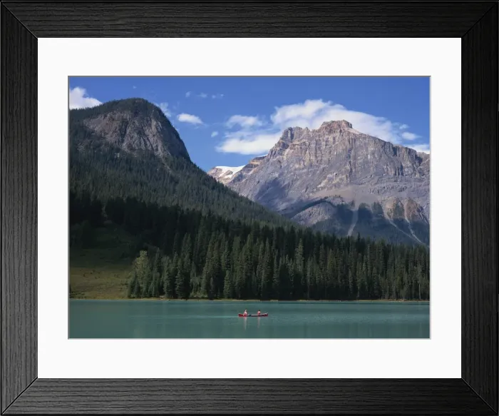 Framed Print : Couple in a canoe on Emerald Lake in the Rocky Mountains in British Columbia Framed Print : Couple in a canoe on Emerald Lake in the Rocky Mountains in British Columbia