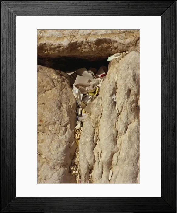 Framed Print : Close-up of notes and prayers placed in a crack on the Western Wall in Jerusalem Framed Print : Close-up of notes and prayers placed in a crack on the Western Wall in Jerusalem