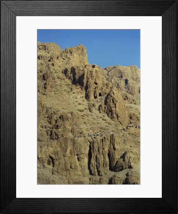 Framed Print : Tourists walking through rocky landscape in Wadi Rumdan, south of Judea Framed Print : Tourists walking through rocky landscape in Wadi Rumdan, south of Judea