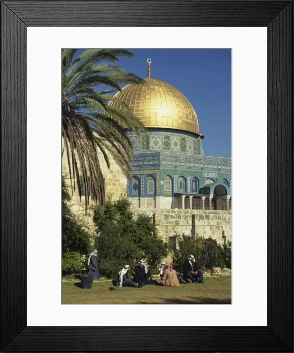 Framed Print : A group of Arab men sit on the grass on Temple Mount, with the gold Dome of the Rock in the background, in the Old City of Jerusalem, Israel Framed Print : A group of Arab men sit on the grass on Temple Mount, with the gold Dome of the Rock in the background, in the Old City of Jerusalem, Israel