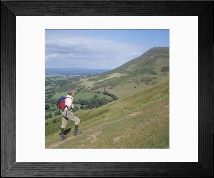 Framed Print : Man ascending Y Grib with Mynydd Bychan in the background, The Black Mountains Framed Print : Man ascending Y Grib with Mynydd Bychan in the background, The Black Mountains