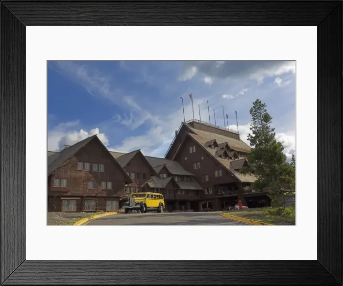 Framed Print : New restored yellow Yellowstone coach outside the historic Old Faithful Inn Framed Print : New restored yellow Yellowstone coach outside the historic Old Faithful Inn