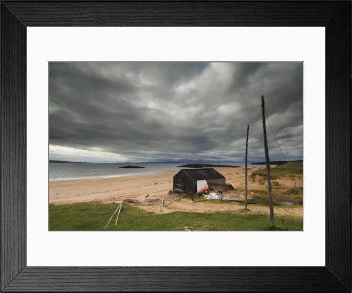 Framed Print : Stormy sky with fishermans hut and net drying poles, Redpoint beach Framed Print : Stormy sky with fishermans hut and net drying poles, Redpoint beach