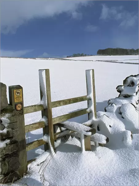 Snow covered stile, Hartington, Tissington Trail, Derbyshire, England, United Kingdom