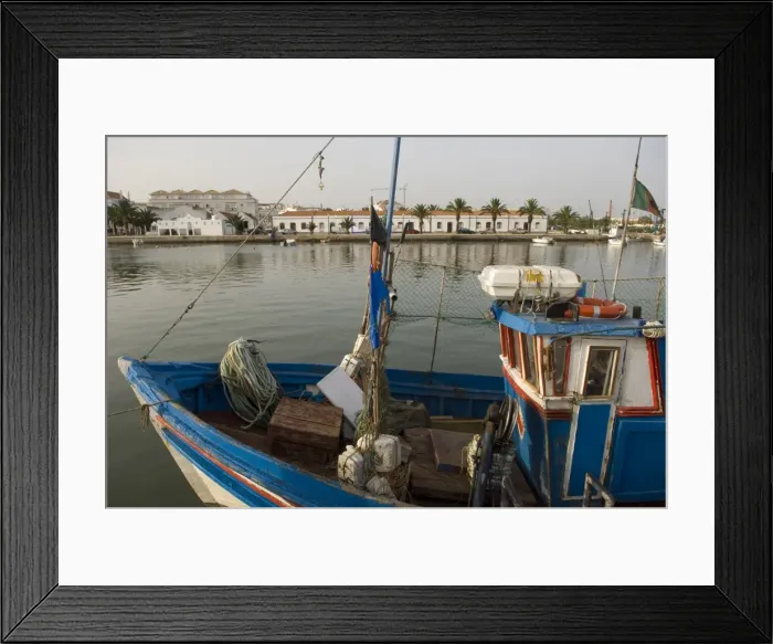 Framed Print : The town of Tavira lies along both sides of the River Gilao, Algarve, Portugal, Europe Framed Print : The town of Tavira lies along both sides of the River Gilao, Algarve, Portugal, Europe