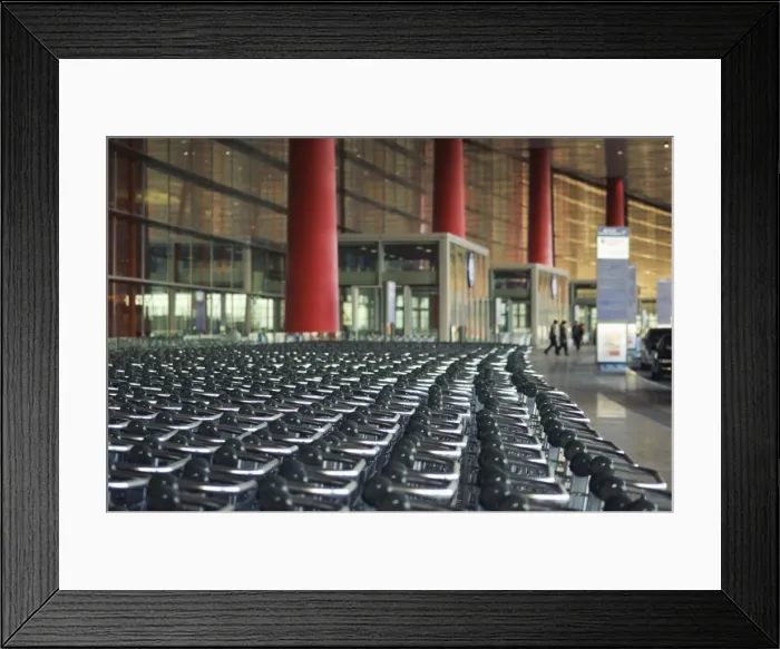 Framed Print : Hundreds of trolleys at Beijing Capital Airport, part of the new Terminal 3 building opened February 2008, second largest building in the world, Beijing Framed Print : Hundreds of trolleys at Beijing Capital Airport, part of the new Terminal 3 building opened February 2008, second largest building in the world, Beijing