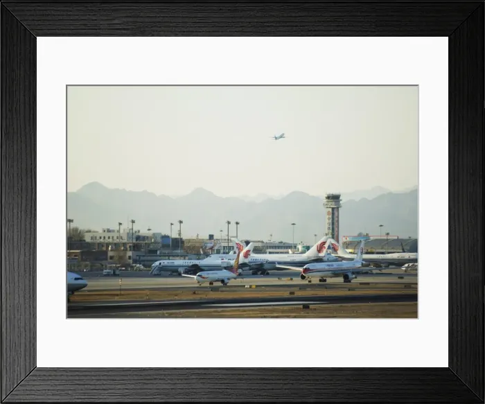 Framed Print : Planes taking off and taxi-ing on the runway at Beijing Capital Airport part of new Terminal 3 building opened February 2008, second largest building in the world, Beijing Framed Print : Planes taking off and taxi-ing on the runway at Beijing Capital Airport part of new Terminal 3 building opened February 2008, second largest building in the world, Beijing