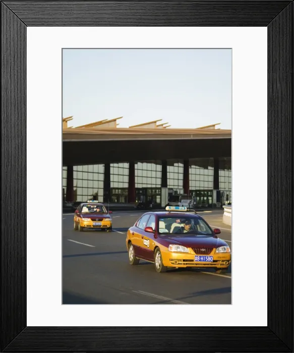 Framed Print : Taxis leaving Beijing Capital Airport part of new Terminal 3 building opened February 2008 Framed Print : Taxis leaving Beijing Capital Airport part of new Terminal 3 building opened February 2008