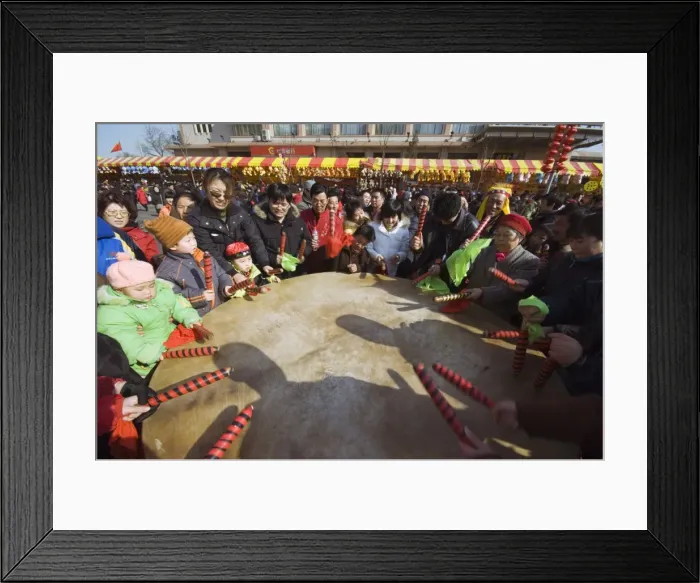 Framed Print : A crowd of people drumming at Changdian Street Fair during Chinese New Year Framed Print : A crowd of people drumming at Changdian Street Fair during Chinese New Year