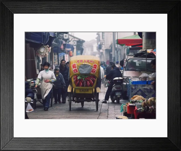Framed Print : A decorated tricycle riding through the old streets of Suzhou, Jiangsu Province Framed Print : A decorated tricycle riding through the old streets of Suzhou, Jiangsu Province