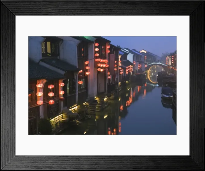 Framed Print : Traditional old riverside houses illuminated at night in Shantang water town Framed Print : Traditional old riverside houses illuminated at night in Shantang water town